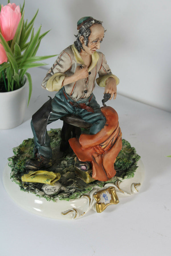 Vintage capodimonte Conte signed porcelain statue leather worker figure