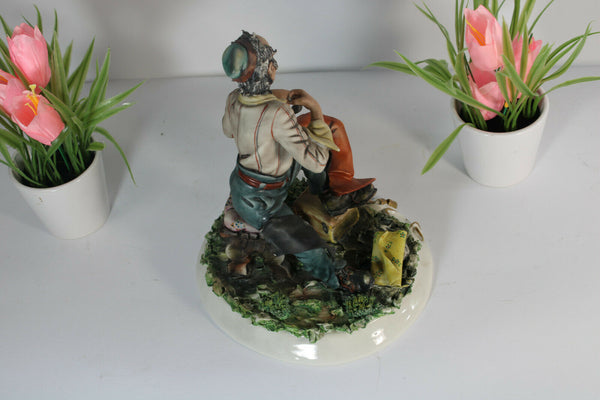 Vintage capodimonte Conte signed porcelain statue leather worker figure