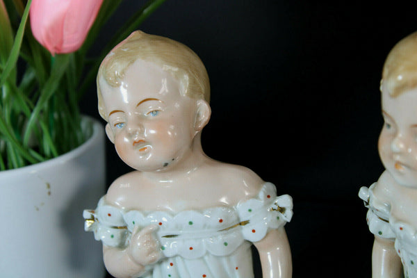 PAIR german porcelain Baby children figurine statue marked