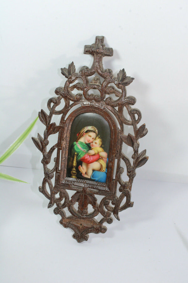 Antique black forest wood carved religious wall plaque porcelain madonna