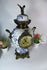 Antique Belgian Boch pottery Delft decor caryatid head bird clock