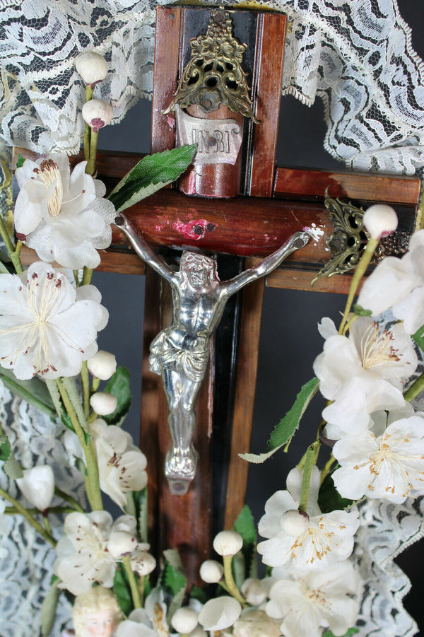 Antique french crucifix wood carved with bisque angels silk flowers