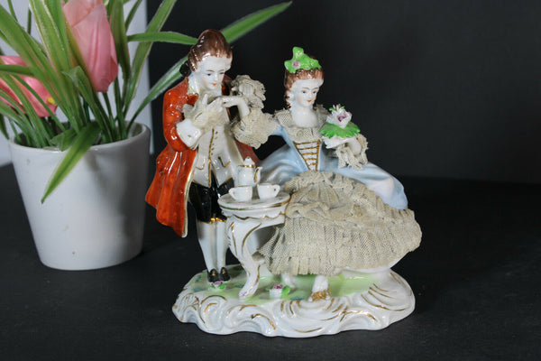 Antique French porcelain statue romantic group lace