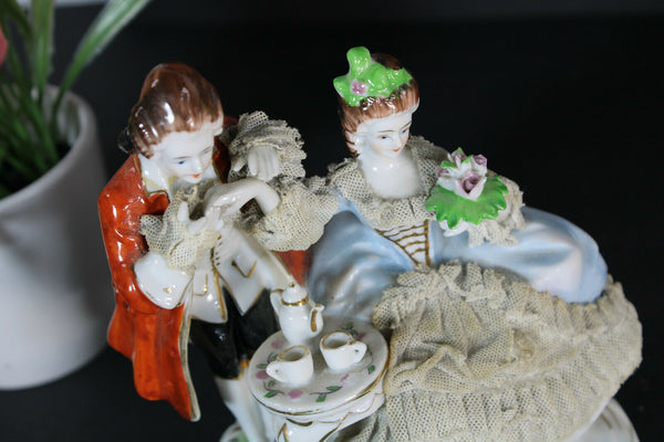 Antique French porcelain statue romantic group lace