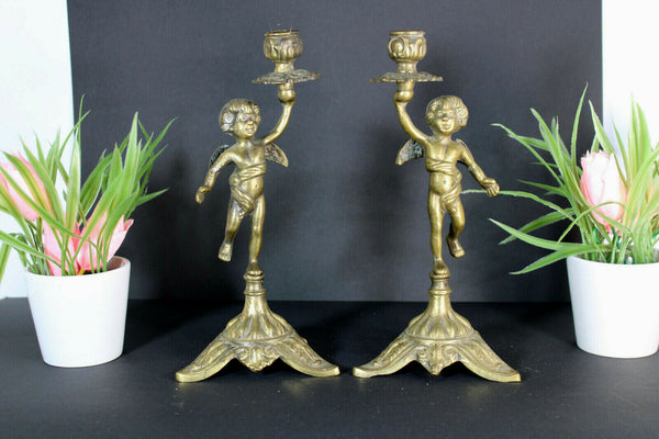 PAIR vintage bronze putti cherub figurine candle holders