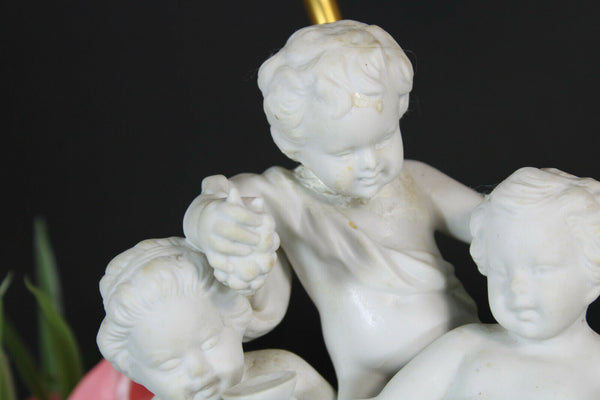 pair german bisque porcelain cherub putti group table lamps marked