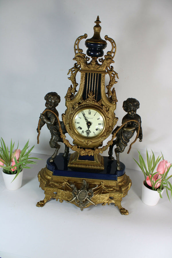 Vintage bronze faun cherub figurine mantel clock imperial FHS movement