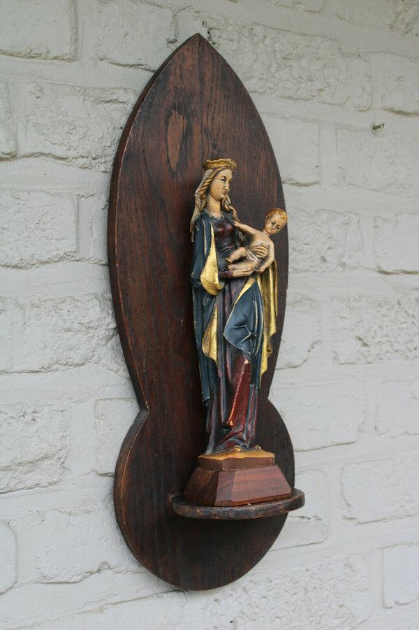 Vintage german wood carved polychrome madonna figurine on wall console