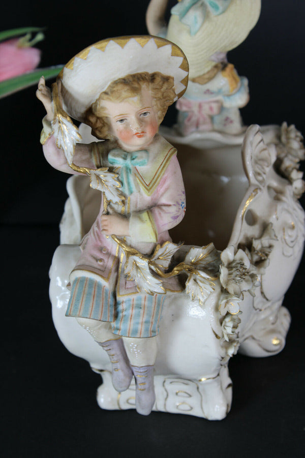 Antique French bisque porcelain boy girl figural planter vase jardiniere