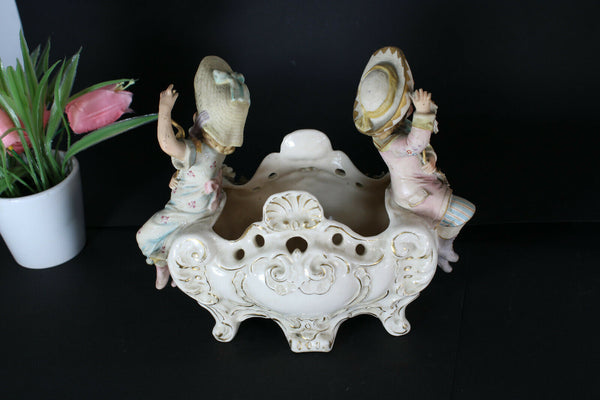 Antique French bisque porcelain boy girl figural planter vase jardiniere