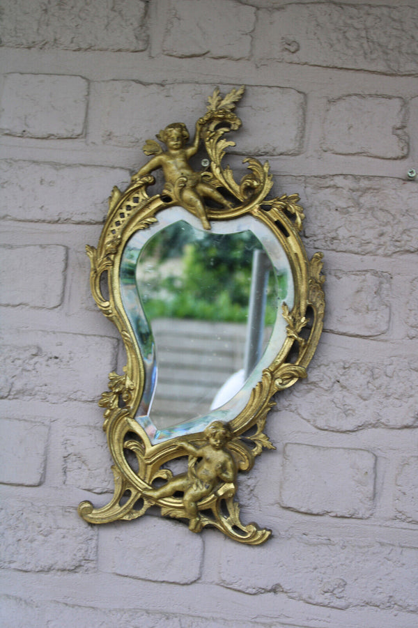 Antique bronze cherub putti figural wall mirror