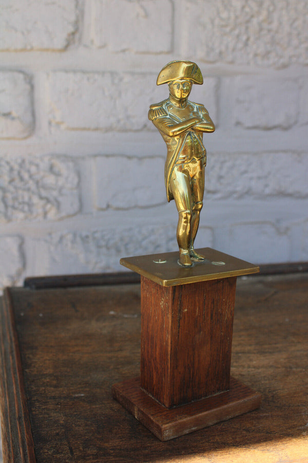 Antique brass napoleon statue on wood pedestal