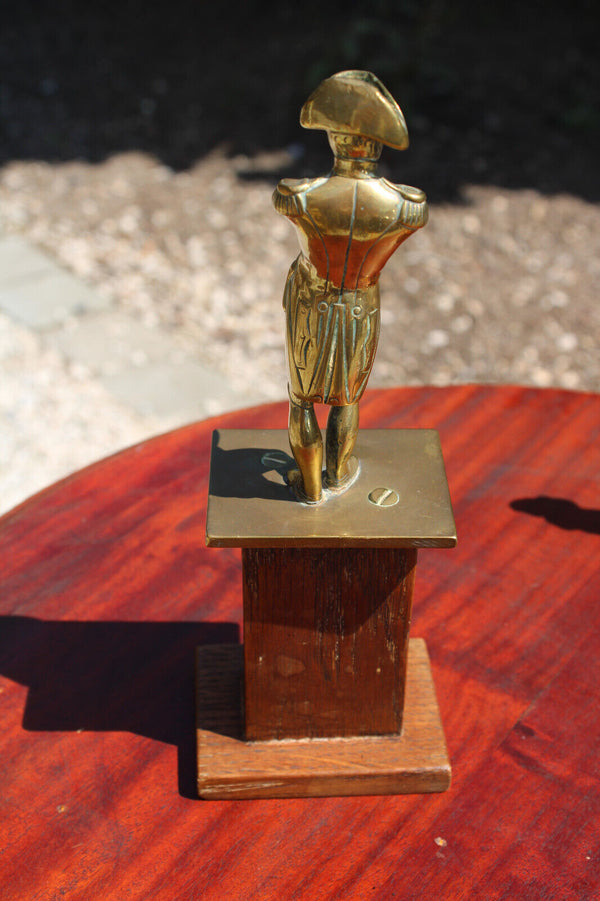 Antique brass napoleon statue on wood pedestal