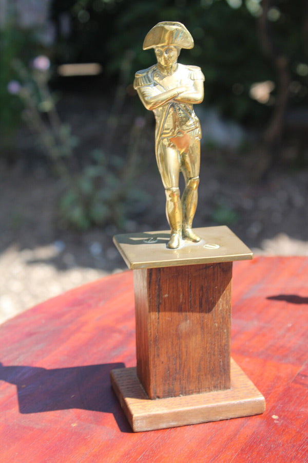 Antique brass napoleon statue on wood pedestal