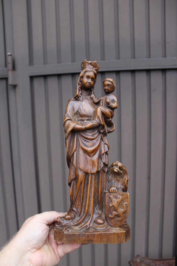 Antique wood carved our lady of Flanders statue religious lion