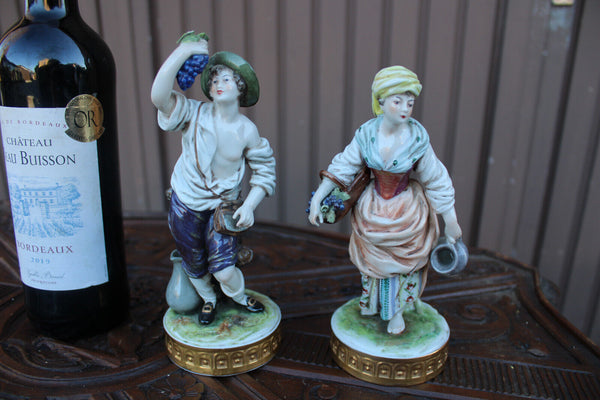 Pair Volkstedt The Grape Pickers German Porcelain Figurines statue