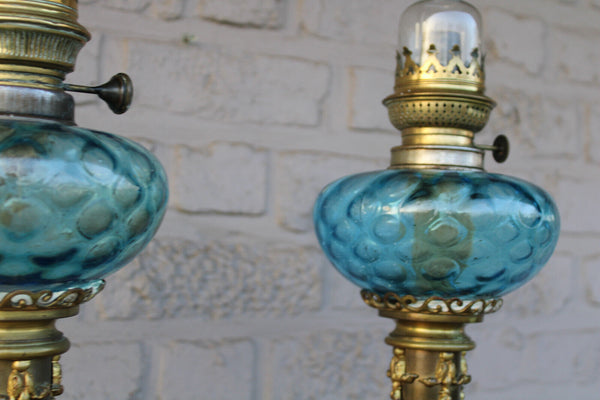 PAIR antique brass oil lamps mythological animals turquoise glass rare