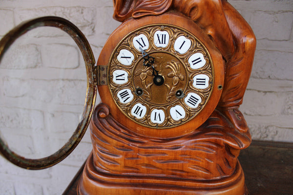 Vintage wood carved pierrot figural clock FHS movement