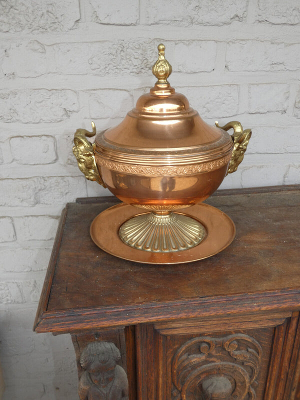 Vintage tin tureen centerpiece bowl with ram heads on plate