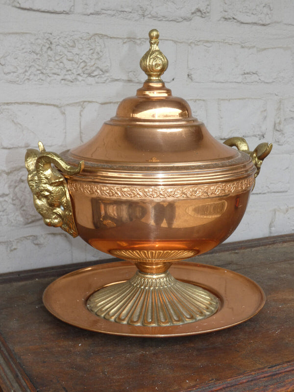 Vintage tin tureen centerpiece bowl with ram heads on plate