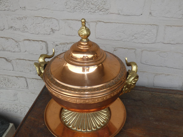 Vintage tin tureen centerpiece bowl with ram heads on plate