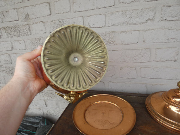 Vintage tin tureen centerpiece bowl with ram heads on plate