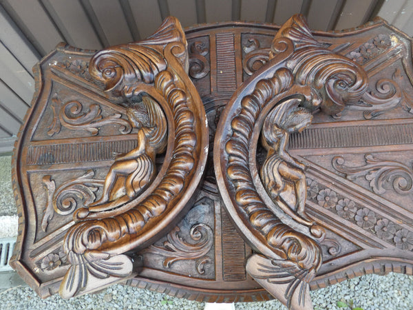 PAIR antique wood carved angel dolphin plaques statues