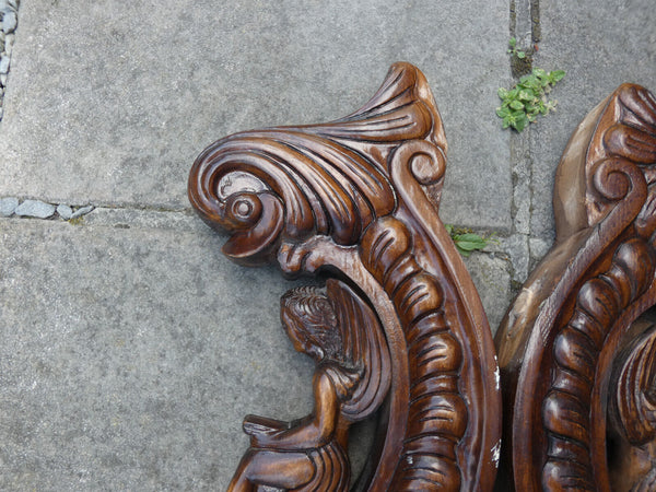 PAIR antique wood carved angel dolphin plaques statues