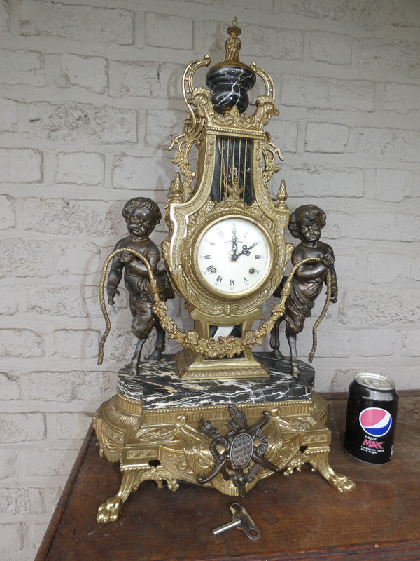 Italian  black marble bronze faun putti figural mantel clock 1970 rare