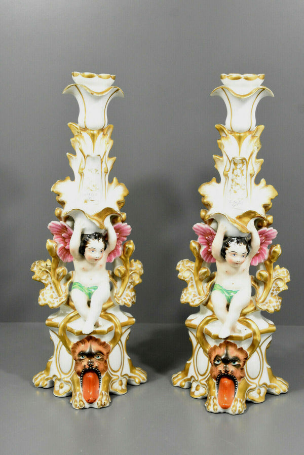 Rare pair antique Vieux paris porcelain putti Lion Candle holders vases