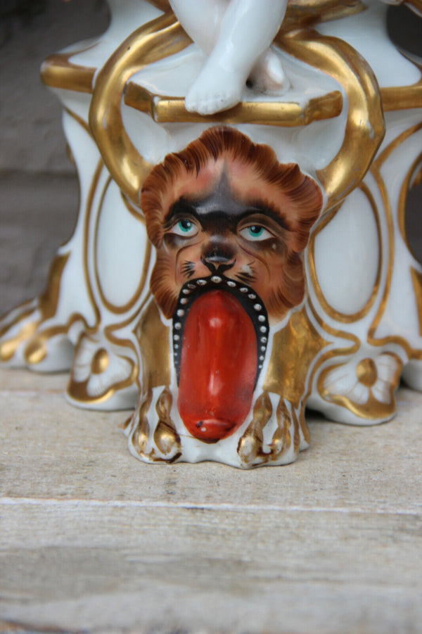 Rare pair antique Vieux paris porcelain putti Lion Candle holders vases