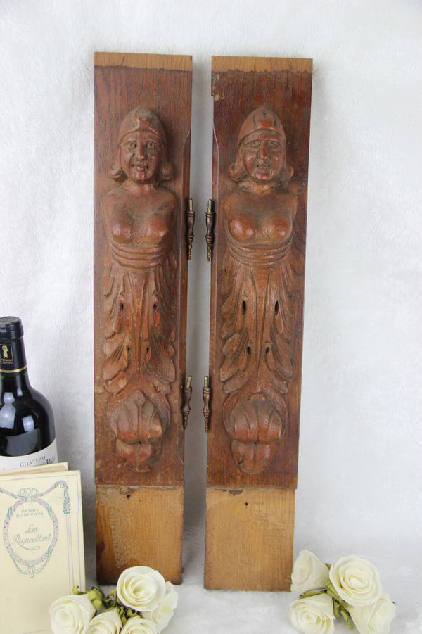 PAIR wood carved figurines from dutch cabinet early 40's