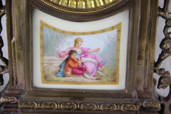 Antique Bronze Clock limoges putti porcelain plaques