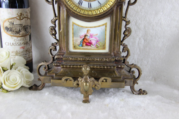 Antique Bronze Clock limoges putti porcelain plaques