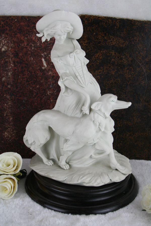 Capodimonte marked Bisque porcelain lady with whippet dog statue marked