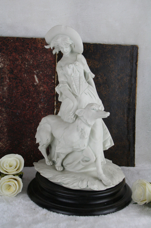 Capodimonte marked Bisque porcelain lady with whippet dog statue marked