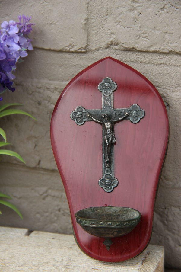 Religious antique French holy water font with crucifix angel portraits