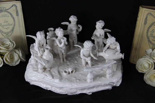 Gorgeous French Antique Bisque porcelain white putti cherubs group