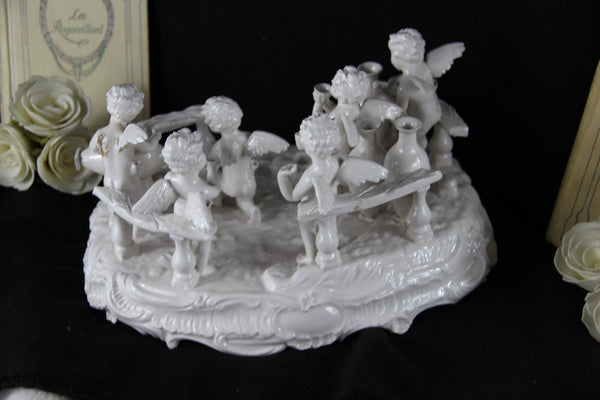 Gorgeous French Antique Bisque porcelain white putti cherubs group