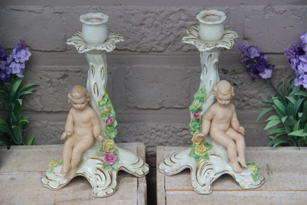 PAIR vintage Dresden porcelain marked candle holders putti figurine