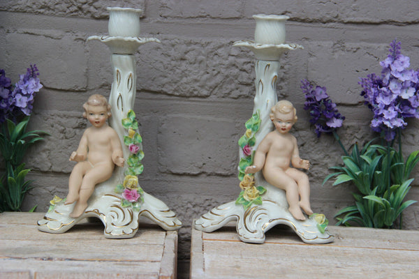 PAIR vintage Dresden porcelain marked candle holders putti figurine