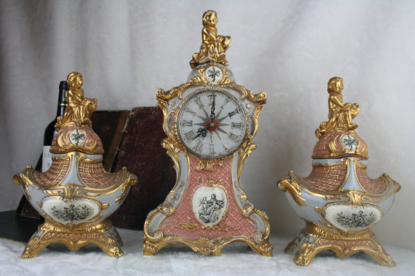 Belgian signed Guerin marked clock pottery faience putti cherubs  urns