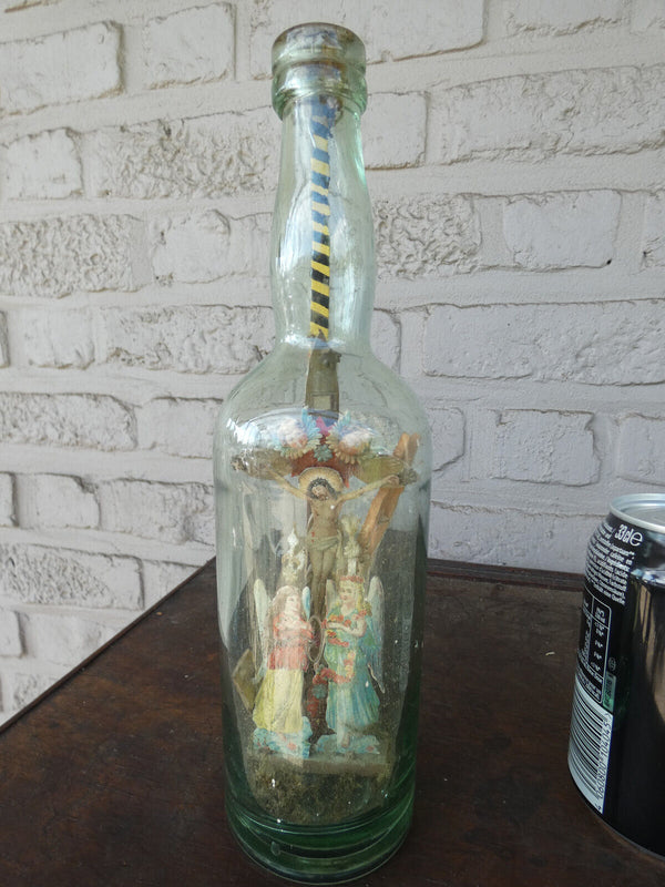 Vintage  folkloric Glass bottle with crucifix inside