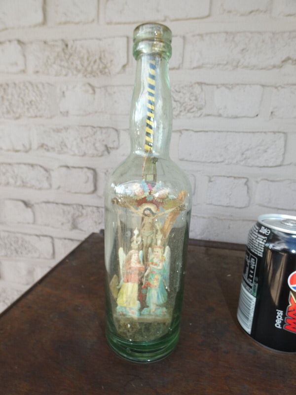 Vintage  folkloric Glass bottle with crucifix inside