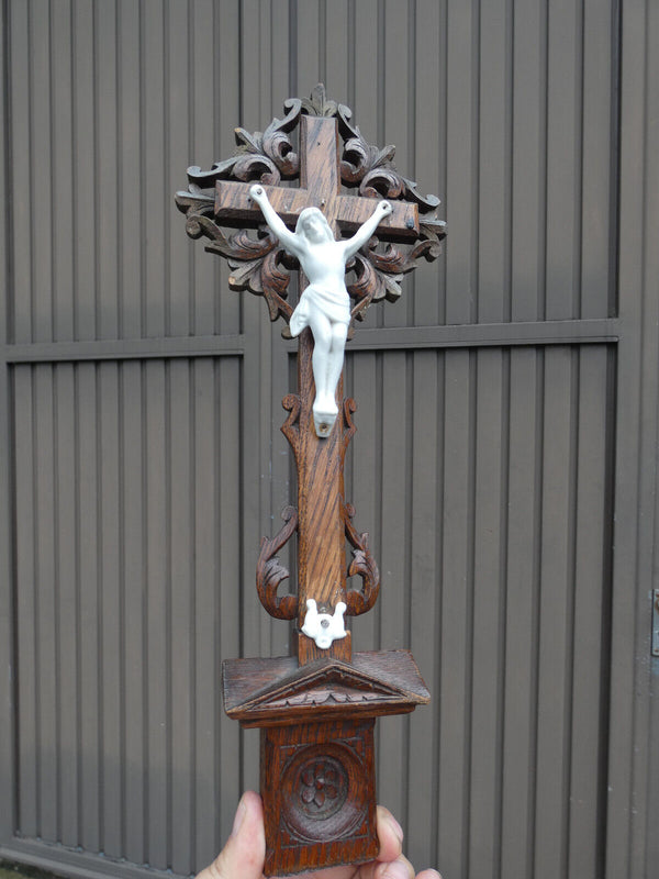 Antique Wood carved crucifix with porcelain bisque corpus christ