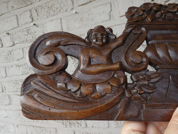 Antique wood carved putti cherub figural wall plaque panel