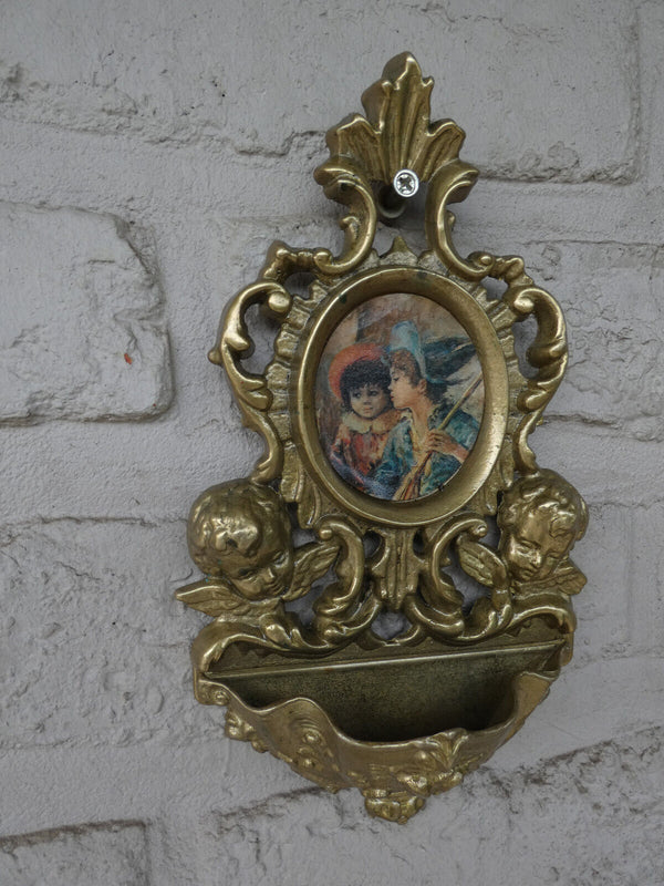 Vintage bronze angels wall holy water font