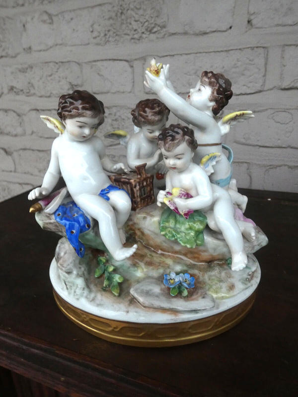 Antique German Volkstedt marked porcelain putti cherub figurine bir group statue