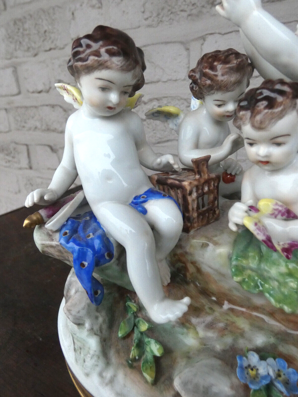 Antique German Volkstedt marked porcelain putti cherub figurine bir group statue