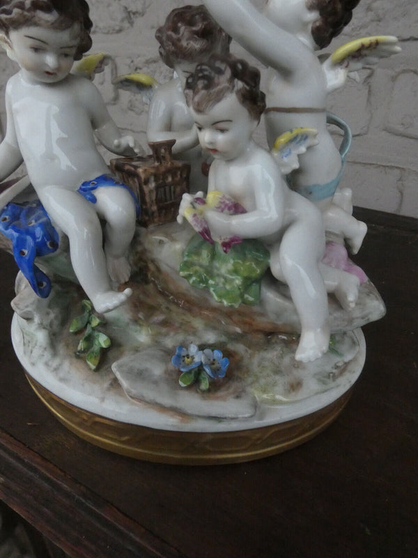 Antique German Volkstedt marked porcelain putti cherub figurine bir group statue